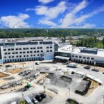Commercial roofing project at Mercy Kings Mills hospital in Mason Ohio with fully-adhered TPO system