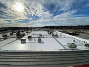 Completed commercial roofing system installed on large building