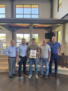 TruCraft Roofing team receiving Carlisle SynTec ESP award for commercial roofing excellence