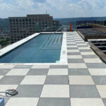 PVC roofing system beneath the rooftop pool deck at City Club in downtown Cincinnati installed by TruCraft Roofing.