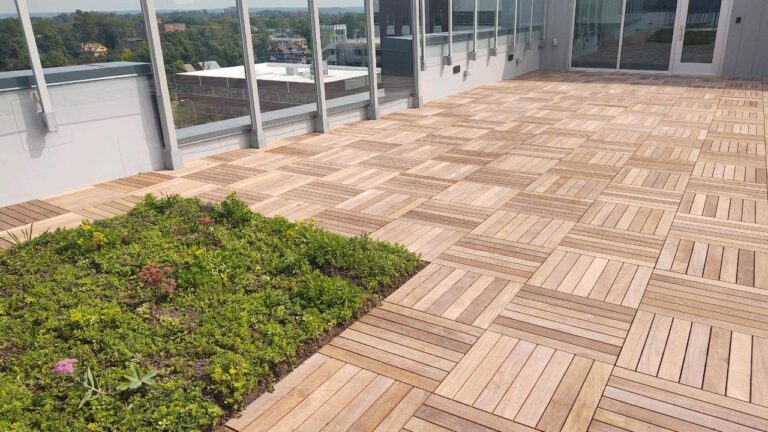 Rooftop deck with pool and pavers on commercial building